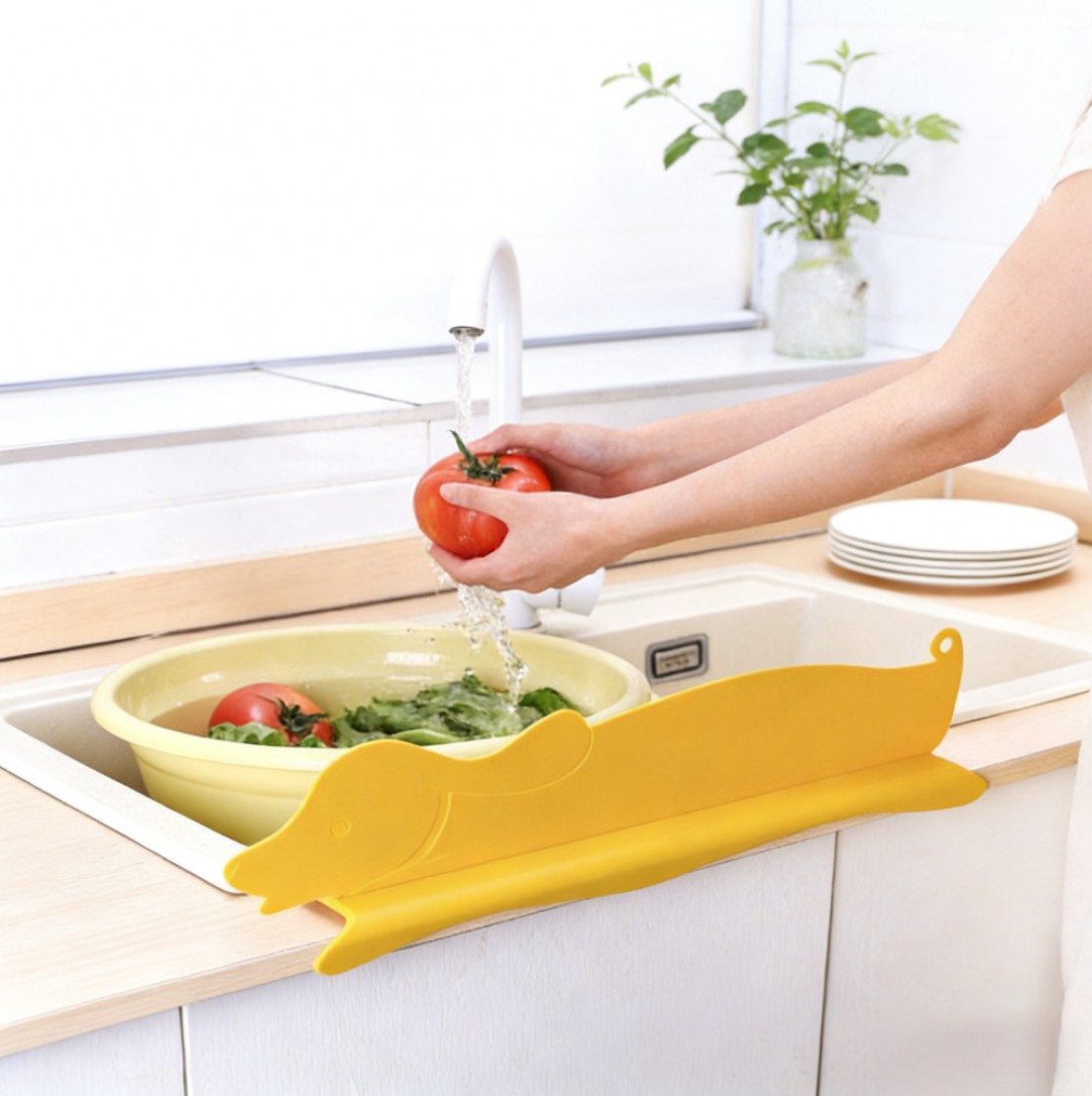 Yellow Dachshund Dog Shaped Sink Splash Guard in Use | Kitchen Anti-Splash Tool sink splash guard, dog shaped sink guard, yellow sink splash blocker, kitchen water shield, pet lover kitchen accessories